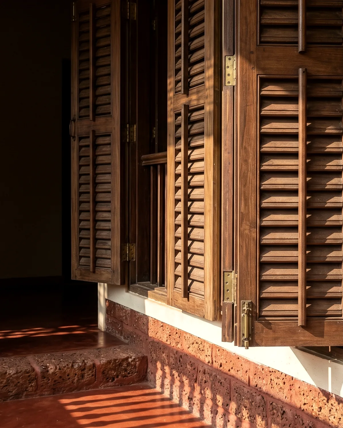 Corner House — Shutters folded into the reveal